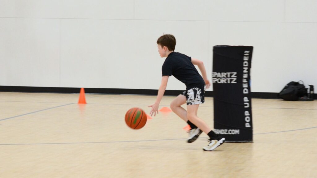 A young Baller practices during Ballerz basketball class at Sawmill Sports Hub