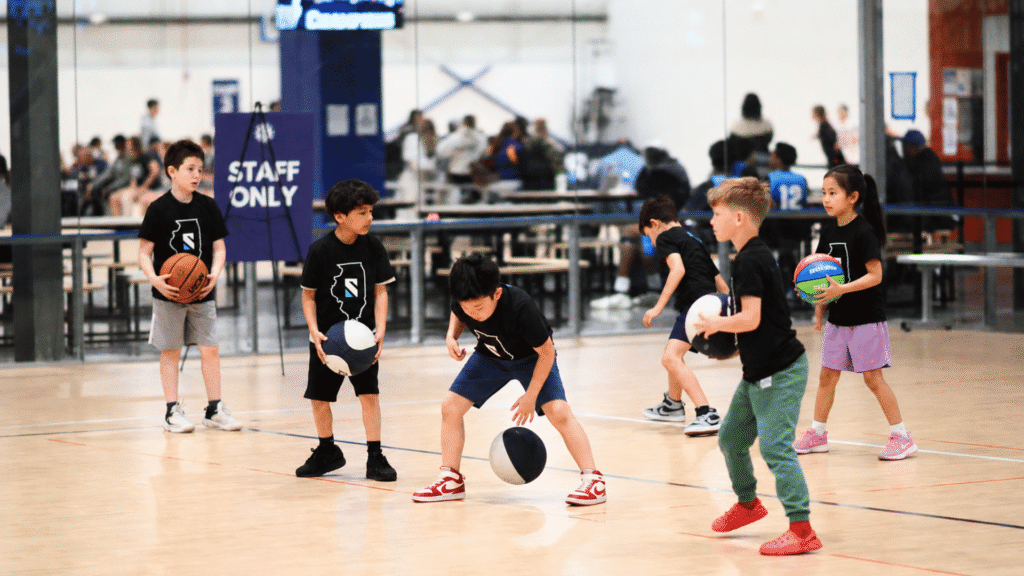 Youth basketball players practicing during summer programs at Sawmill Sports Hub