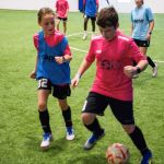 2 youth soccer players practice at Sawmill.
