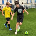 2 soccer players participate in Sawmill's recreational soccer league.
